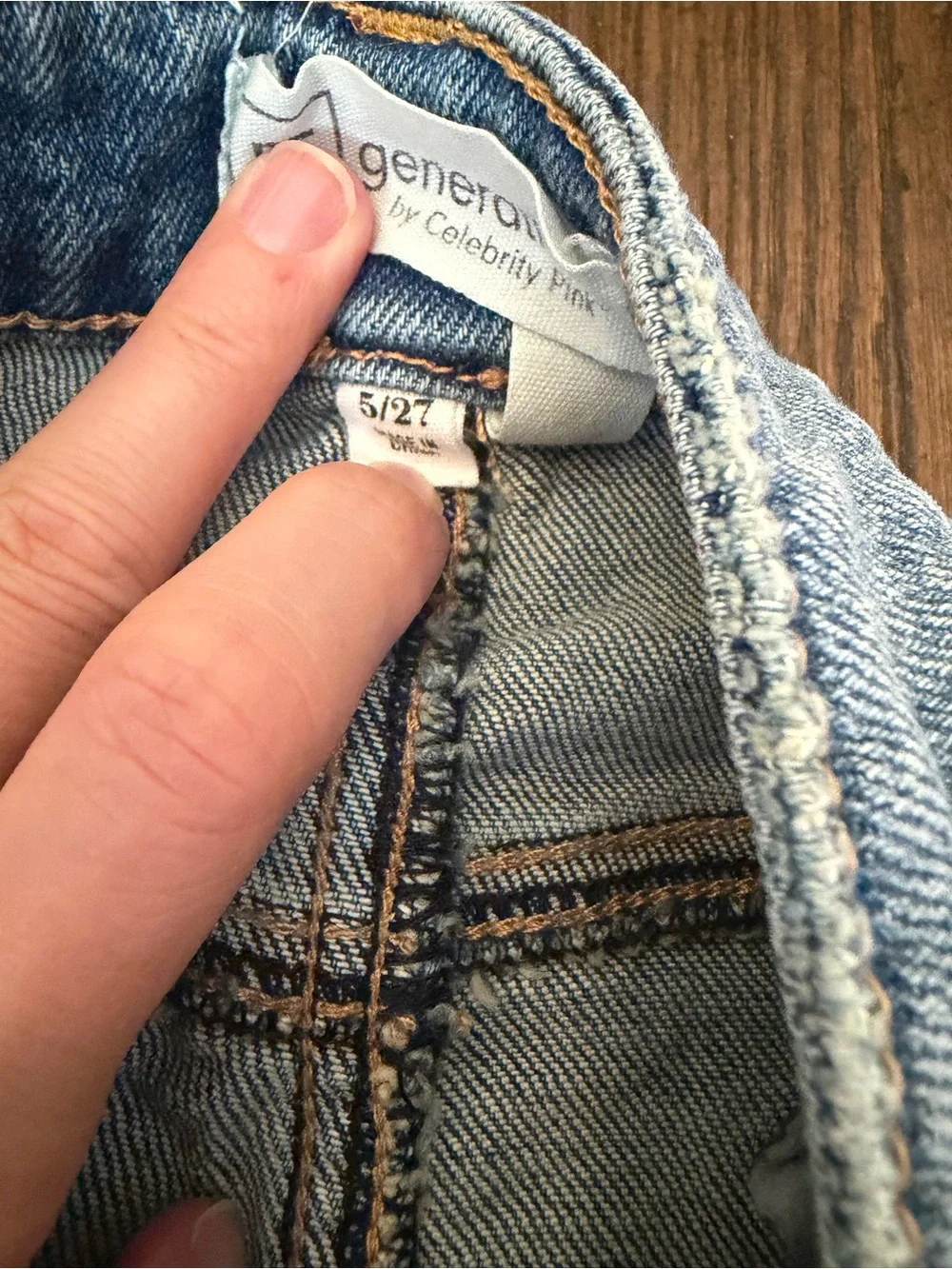 High-Rise Frayed Light Wash Denim Shorts
